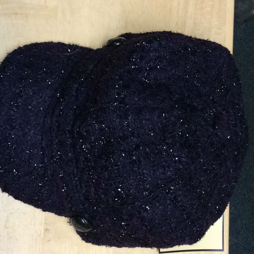 Plum hat accented with plum shinny thread